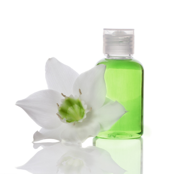 bath items - liquid soap and flower - Фото, изображение