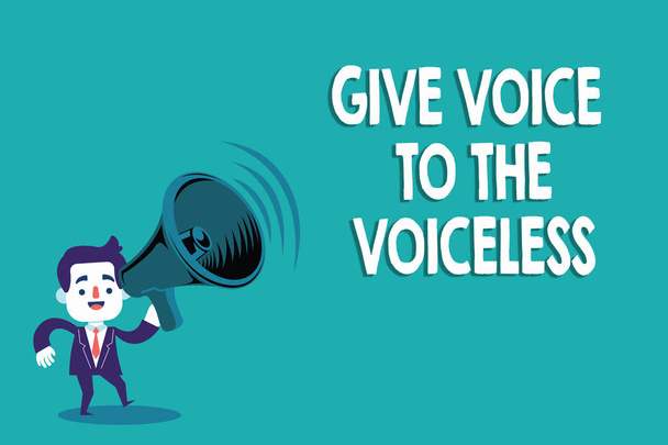 Scrittura concettuale a mano che mostra Give Voice To The Voiceless. Testo della foto aziendale Parla a nome di difendere i vulnerabili
 - Foto, immagini
