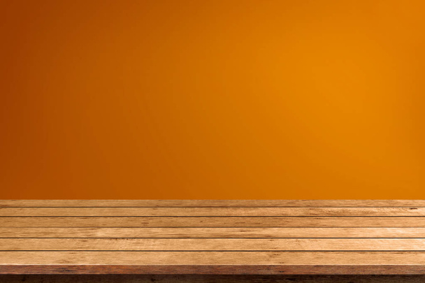 Halloween empty wooden tabletop on orange background. Use for product display montage. - Photo, Image