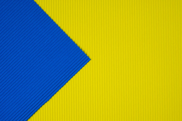 Blue and yellow corrugated paper texture, use for background. vivid colour with copy space for add text or object. - Φωτογραφία, εικόνα