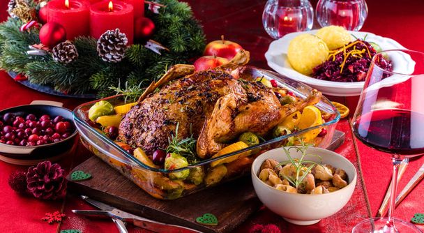 Christmas roast duck served on a festive table - Fotografie, Obrázek