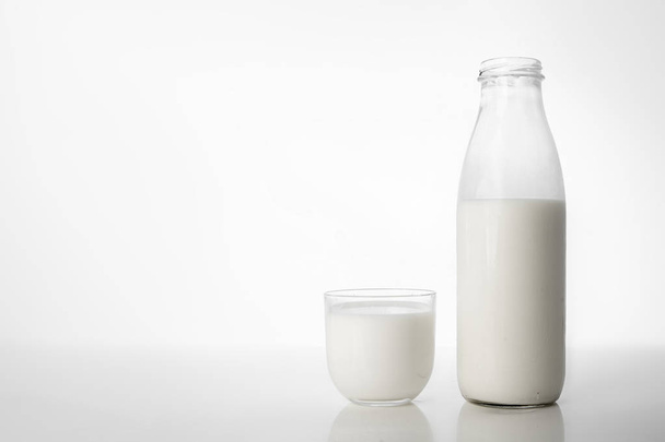 Natural organic milk product in the bottle. - Photo, image