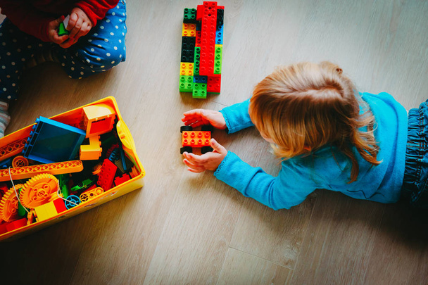 kids play with plastic blocks, learning concept - Photo, Image