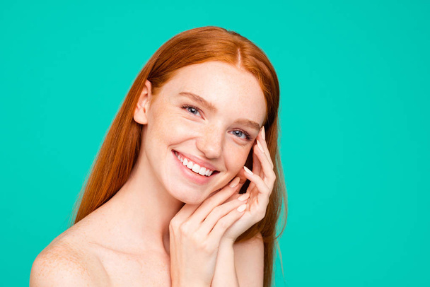 Advertising concept. Cheerful nude natural red girl, shiny pure fresh smooth flawless skin, after detox, collagen, botox, peeling, isolated over green turquoise background - Foto, Imagen