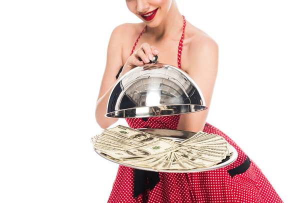 cropped shot of pin up woman with dollar banknotes on serving tray isolated on white - Photo, Image