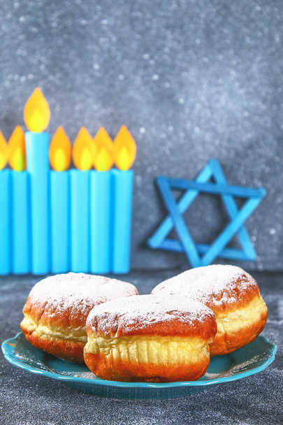 Jewish holiday Hanukkah and its attributes, menorah, donuts, Star of David - Valokuva, kuva