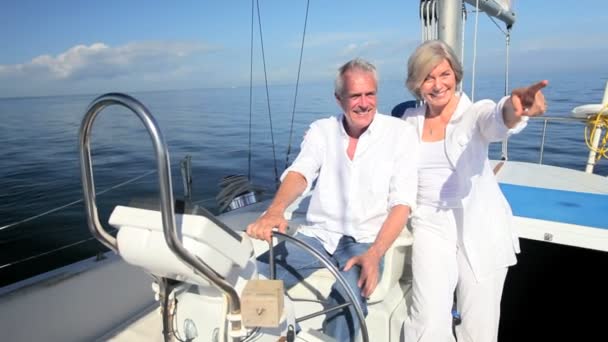 Seniors Sailing Their Luxury Yacht - Footage, Video