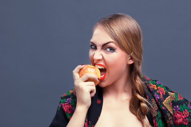 Young pretty woman with apple - Foto, Imagen