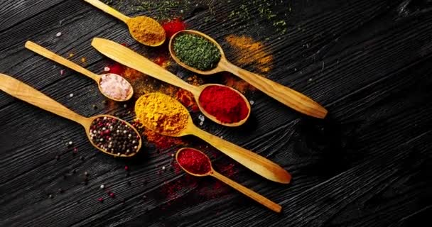 Different spices placed in spoons - Footage, Video