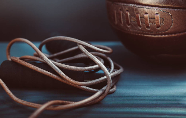 closeup photo of a skipping rope and a soccer ball - Photo, Image