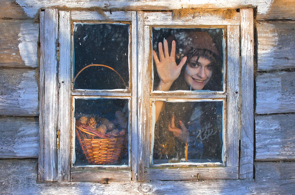 bruja es bastante loco, ella mira por la ventana y riendo mirando fijamente a los ojos, puede ser que ella hizo lo desagradable, y puede ser feliz hoy
 - Foto, Imagen