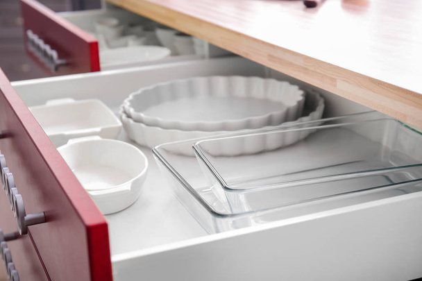 Set of clean dishes in kitchen drawer - Photo, Image