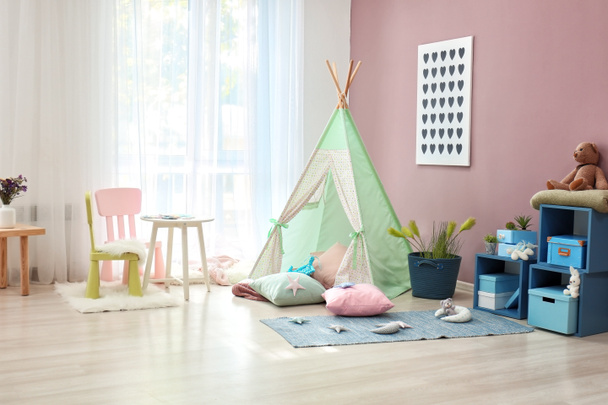 Cozy play tent for kids in interior of room - Fotó, kép