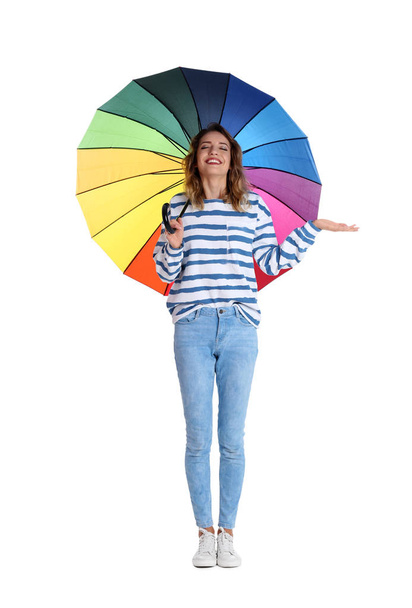 Woman with rainbow umbrella on white background - Photo, Image