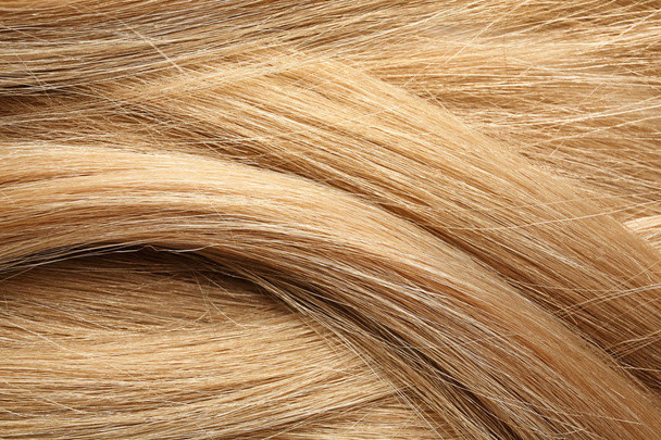Textura de cabello rubio saludable como fondo, primer plano
 - Foto, imagen