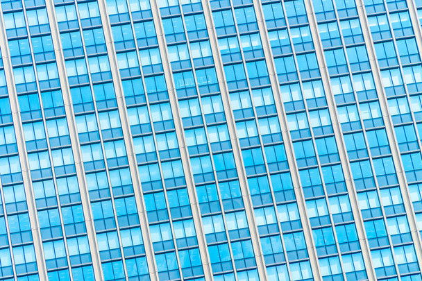 Bel immeuble de bureaux d'affaires d'architecture avec motif de verre de fenêtre dans la ville gratte-ciel
 - Photo, image