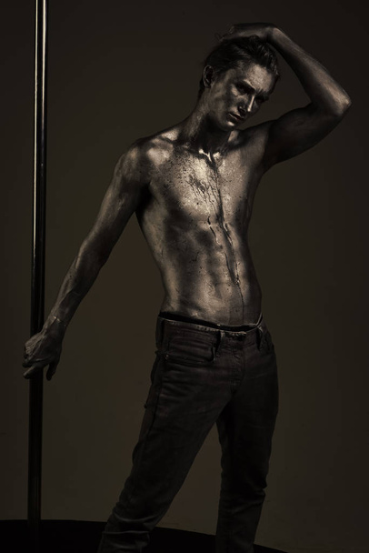 Macho with naked chest, athlete, sportsman hold metallic pole. - Foto, Imagem
