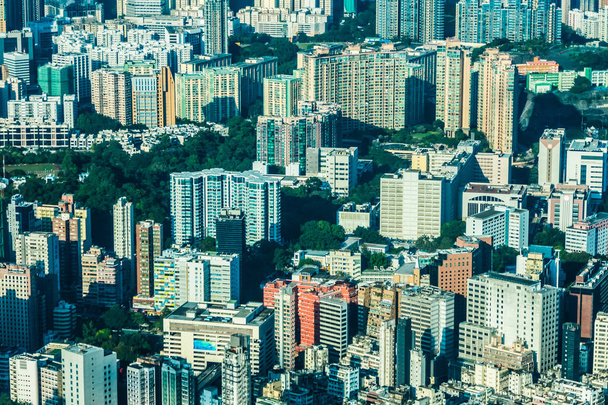 Belo edifício de arquitetura com padrão de hong kong pessoas residenciais na cidade
 - Foto, Imagem