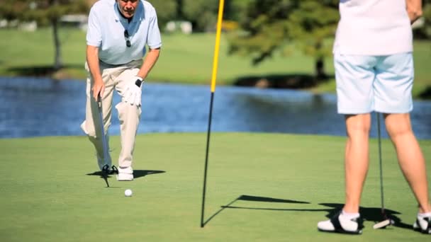 Enjoying Retirement Playing Golf - Materiaali, video