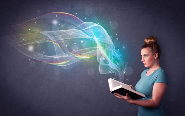 Young lady holding book with waves - Foto, Imagem