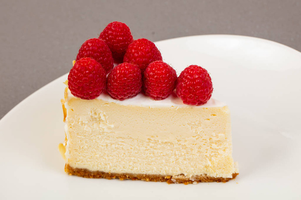 Cheesecake with raspberry in the bowl - Photo, Image