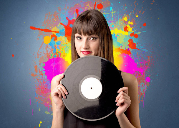 Lady holding vinyl record - Foto, Bild