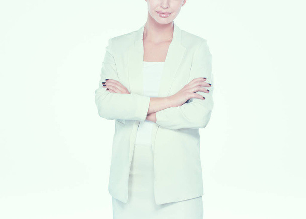 Young woman standing on white background - Valokuva, kuva