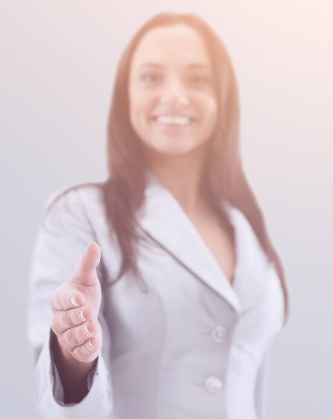 Businesswoman in gray suit posing on isolated background - Foto, Imagen
