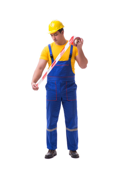 Funny worker wearing coveralls with tape - Zdjęcie, obraz