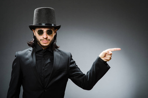 Vintage concept with man wearing black top hat - Foto, immagini