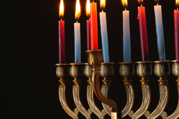 image of jewish holiday Hanukkah background with menorah (traditional candelabra) and candles - Photo, image