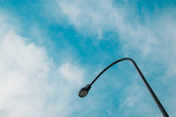 Light Pole on the sky in Shinjuku, Japan. Shinjuku is located in the central of Tokyo and usually there are many people around. - 写真・画像