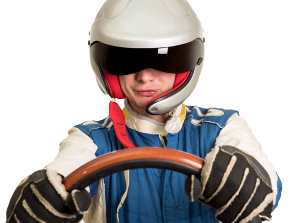 Piloto de carreras en el casco mientras conduce. Sobre un fondo blanco
 - Foto, Imagen