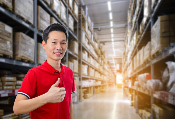 Asian man with warehouse image blur background - Photo, Image