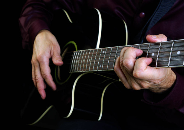 Playing an Acoustic Guitar. Closeup. Guitarist hands and guitar - Zdjęcie, obraz