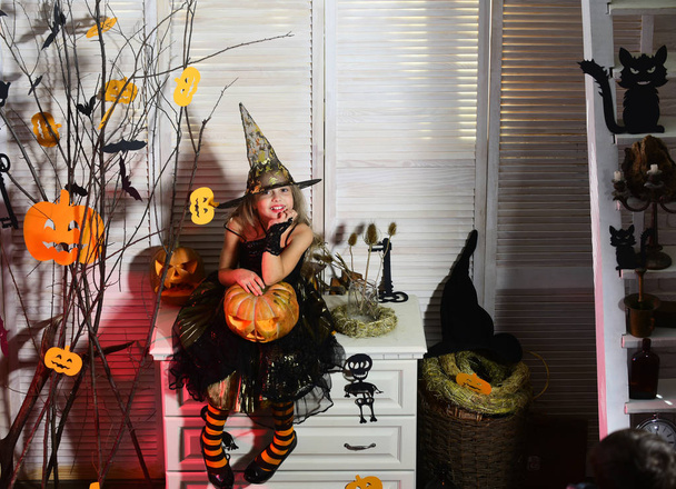 Halloween party and celebration concept. Kid in witch hat - Photo, Image