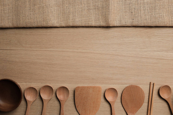 wooden table top with Kitchen ware for the background - Fotoğraf, Görsel
