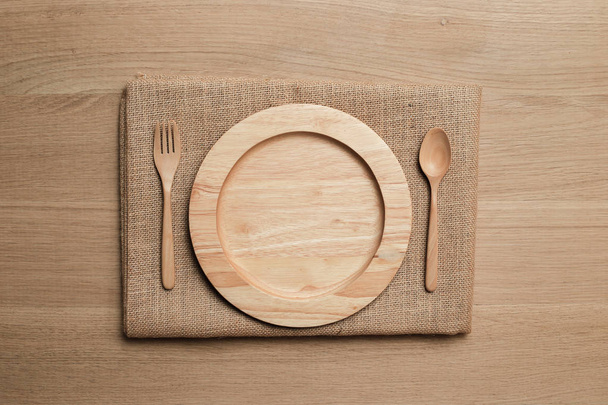 wooden table top with Kitchen ware for the background - Foto, Imagem