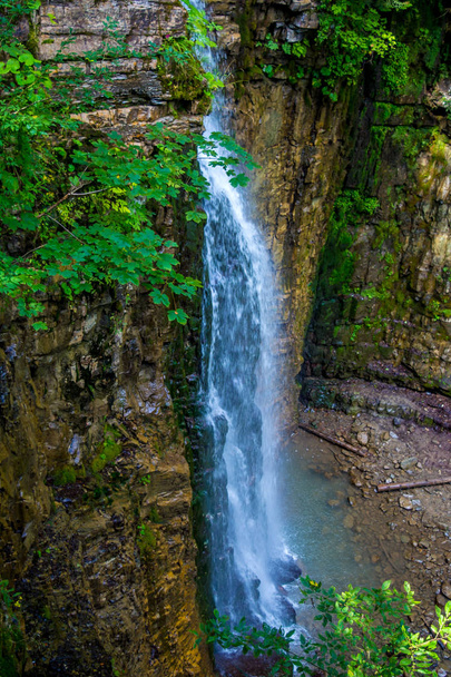 Photo of high beautiful waterfall in Carpathian mountains - Photo, Image