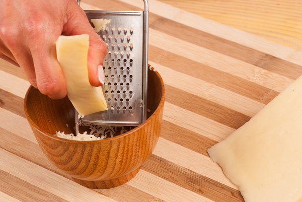 Grating cheese - Фото, изображение