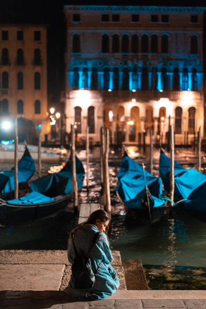 Beautiful Young Traveler Woman Taking Photos in Venice - 写真・画像