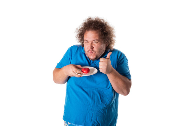 Funny fat man with cake. Happy birthday. Joy and fun - Fotó, kép