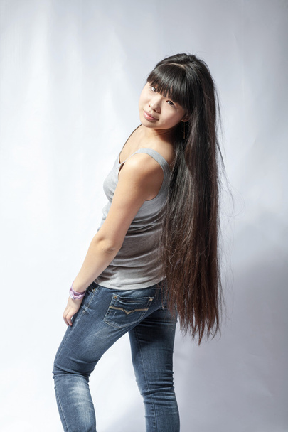 back view of standing young beautiful Asian woman - Fotografie, Obrázek