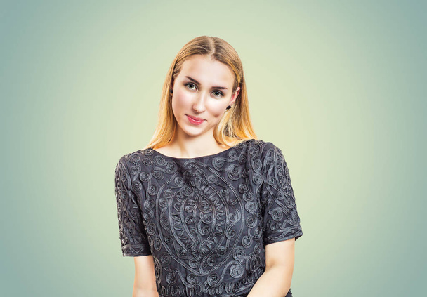 Portrait of modern confident blond woman wearing elegant ornamental blouse smiling at camera - Fotografie, Obrázek