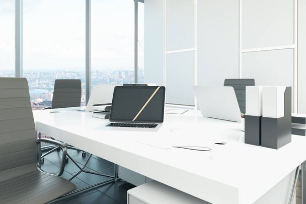Close up of desk with laptop in modern white office with city view. 3D Rendering  - Photo, image