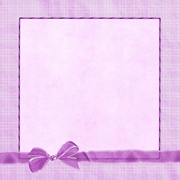 Pink bow on plaid frame - Foto, afbeelding