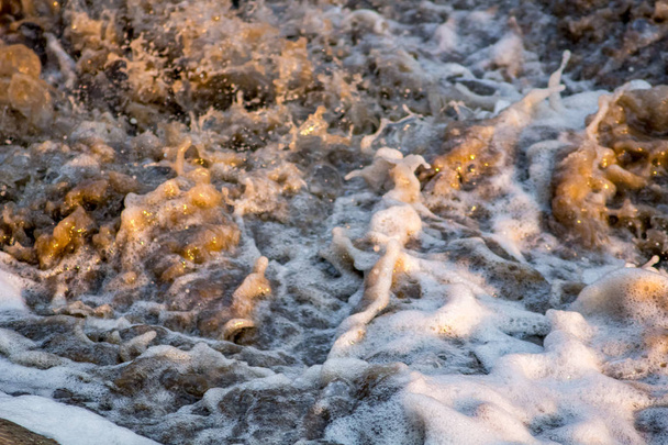 Water splashes with foam - Foto, Bild