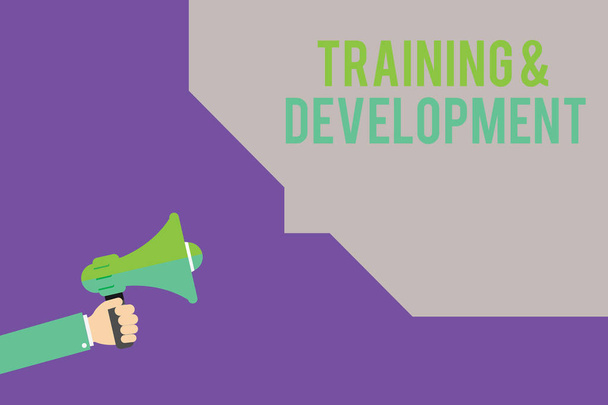 Text sign showing TrainingandDevelopment. Conceptual photo Organize Additional Learning expedite Skills - Photo, Image