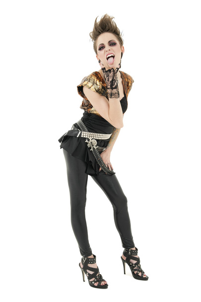 Portrait of punk woman sticking out tongue with rock sign over white background - Foto, immagini