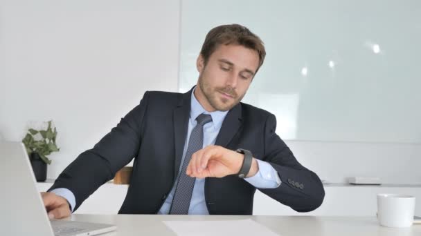 Businessman Checking Message on Smartwatch - Video